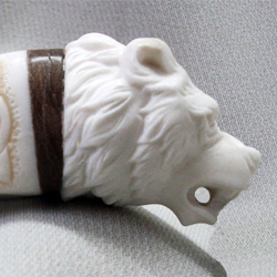 amulet-bookmark the head of a bear from the set of a young sorceress based on the book Master of talismans from Abalak